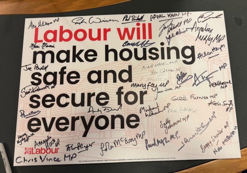 A sign which reads "Labour will make housing safe and secure for everyone"